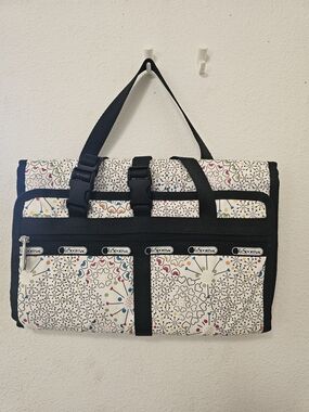 Lesportsac Toiletry Travel Bag with Multicolor Heart & Star Motif